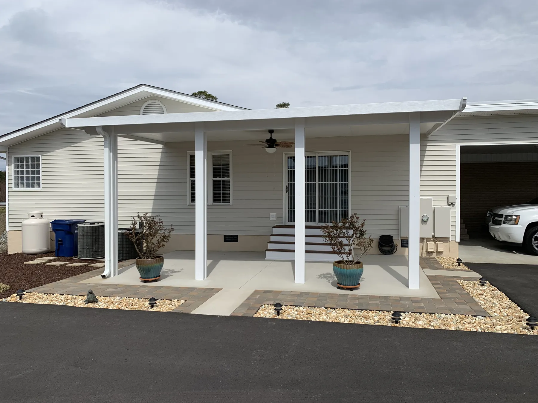 White attached patio cover