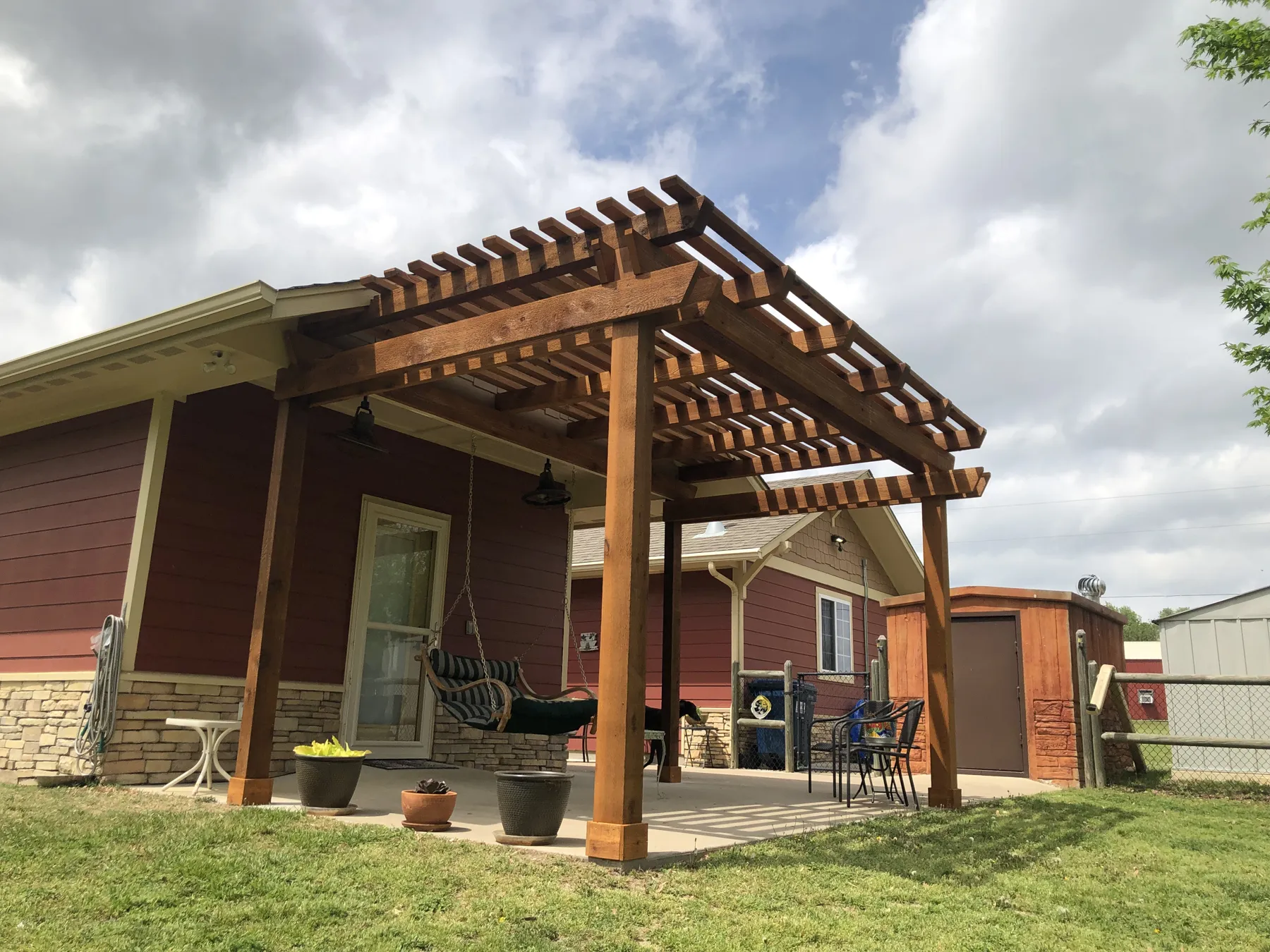 Attached cedar pergola